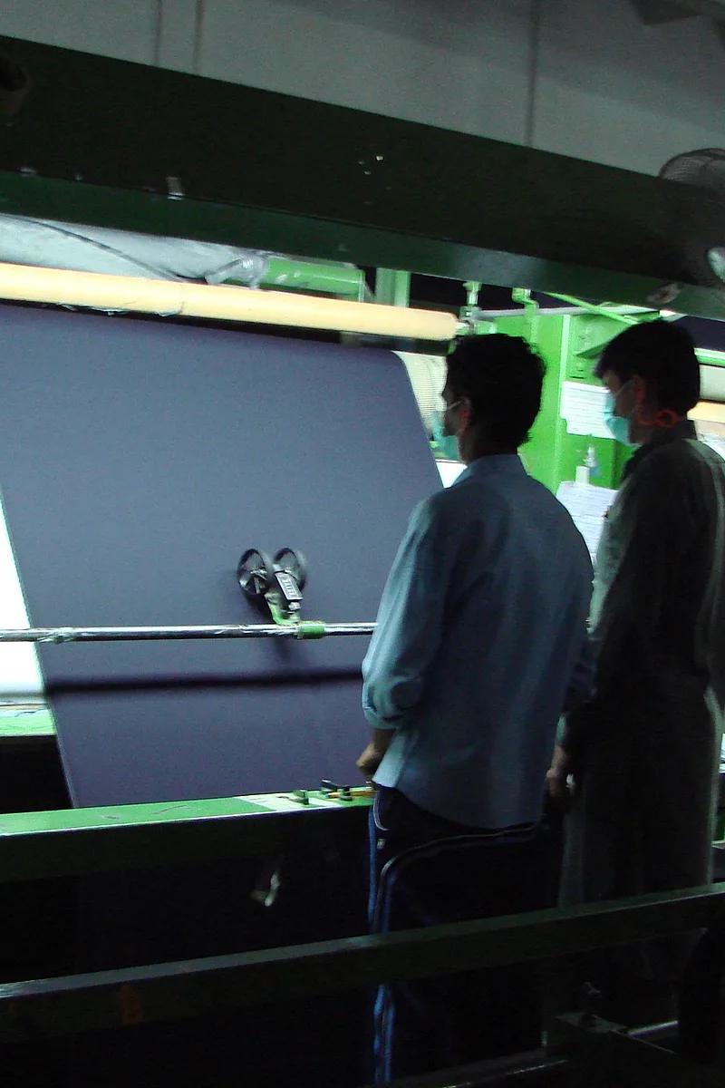 Finishing line with machines and denim rolls